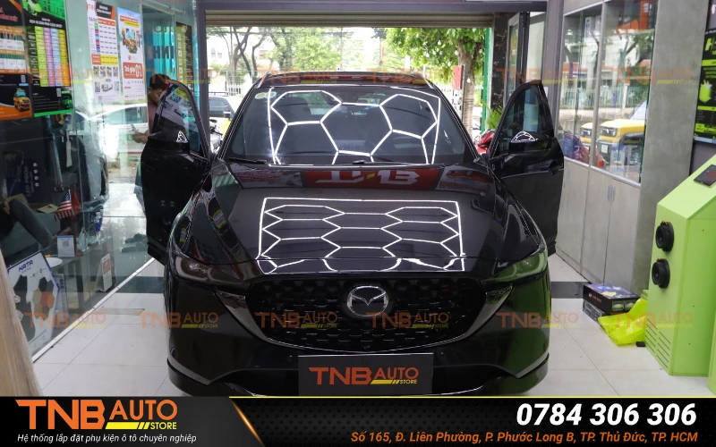 Độ bi gầm Mazda CX-5 sáng rõ, an toàn khi đi đêm 4 TNB Auto Store – Giải pháp độ đèn bi gầm an toàn cho Mazda CX-5 tại Thủ Đức, TP.HCM và khu vực lân cận